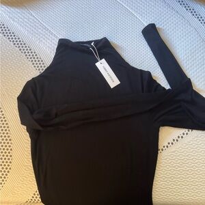 Naked wardrobe mock neck long sleeve dress.